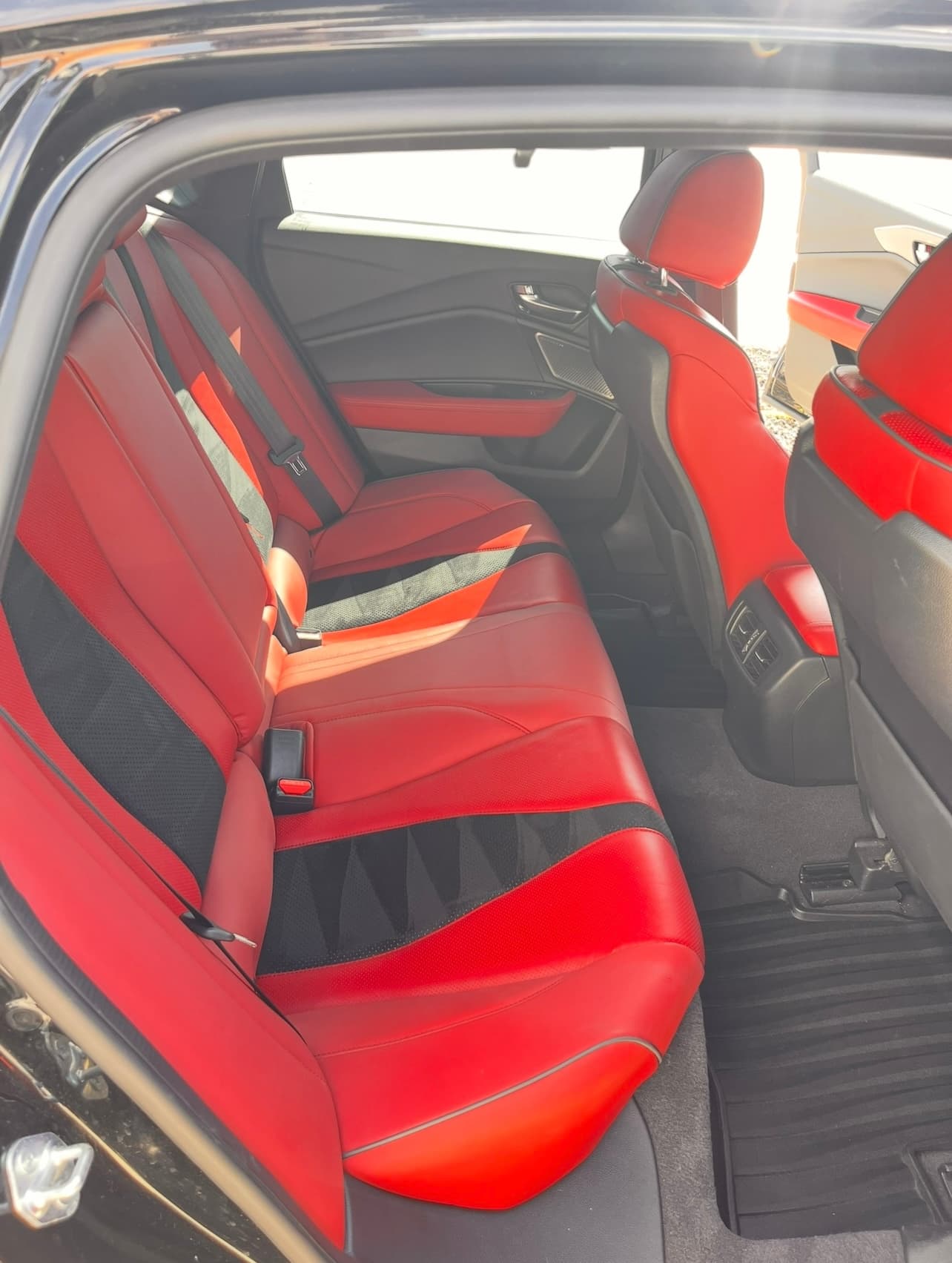 Detailed rear seats with custom red leather